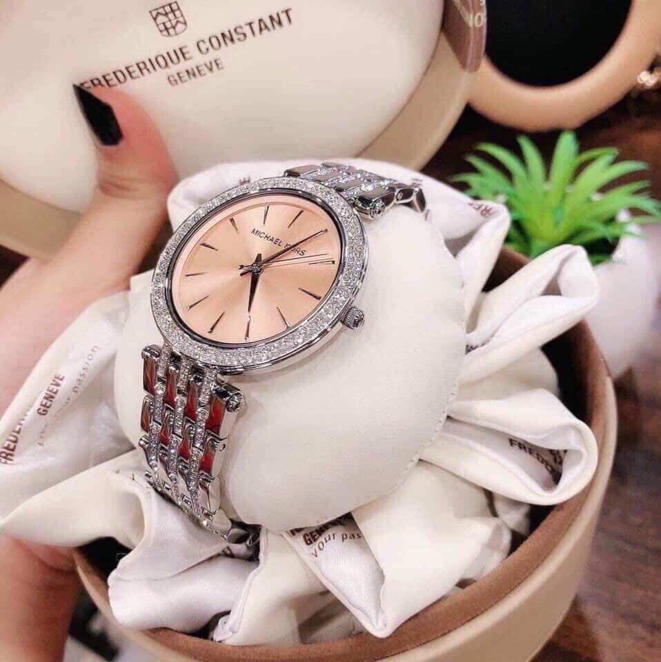 mkia50391183-mk-pha-le-8 Đồng hồ Michael Kors MK3218 mặt hồng cam viền pha lê 2 tầng