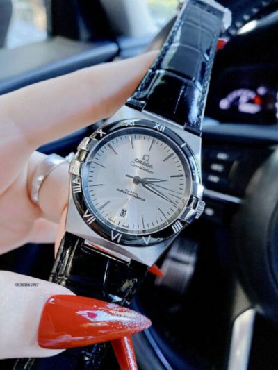 Đồng hồ Nam Omega máy cơ viền bạc dây da đen mặt trắng cao cấp