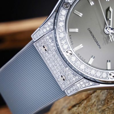 Đồng hồ Hublot Genever Cặp Nam Nữ viền đính đá mặt xám